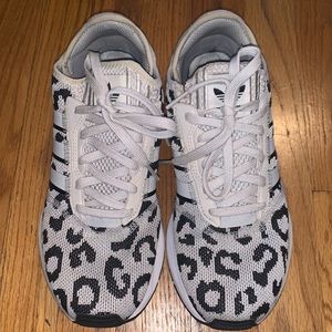 Adidas Swift Run Leopard print tennis shoes